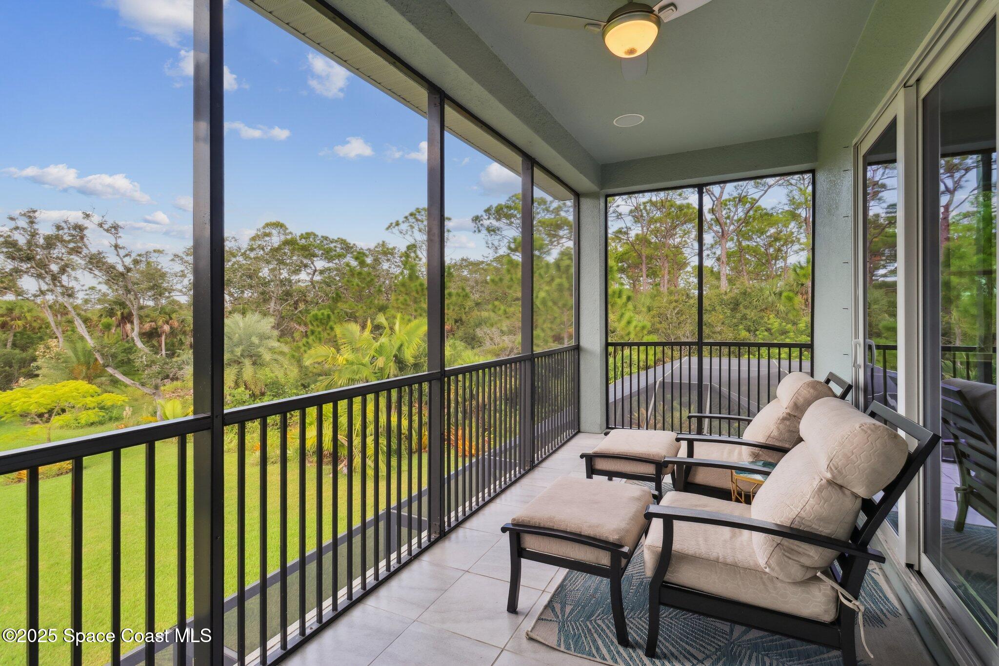 4437 Preservation Circle Melbourne, FL 32934 - Photo 22 of 40 a view of a chairs and table in the balcony