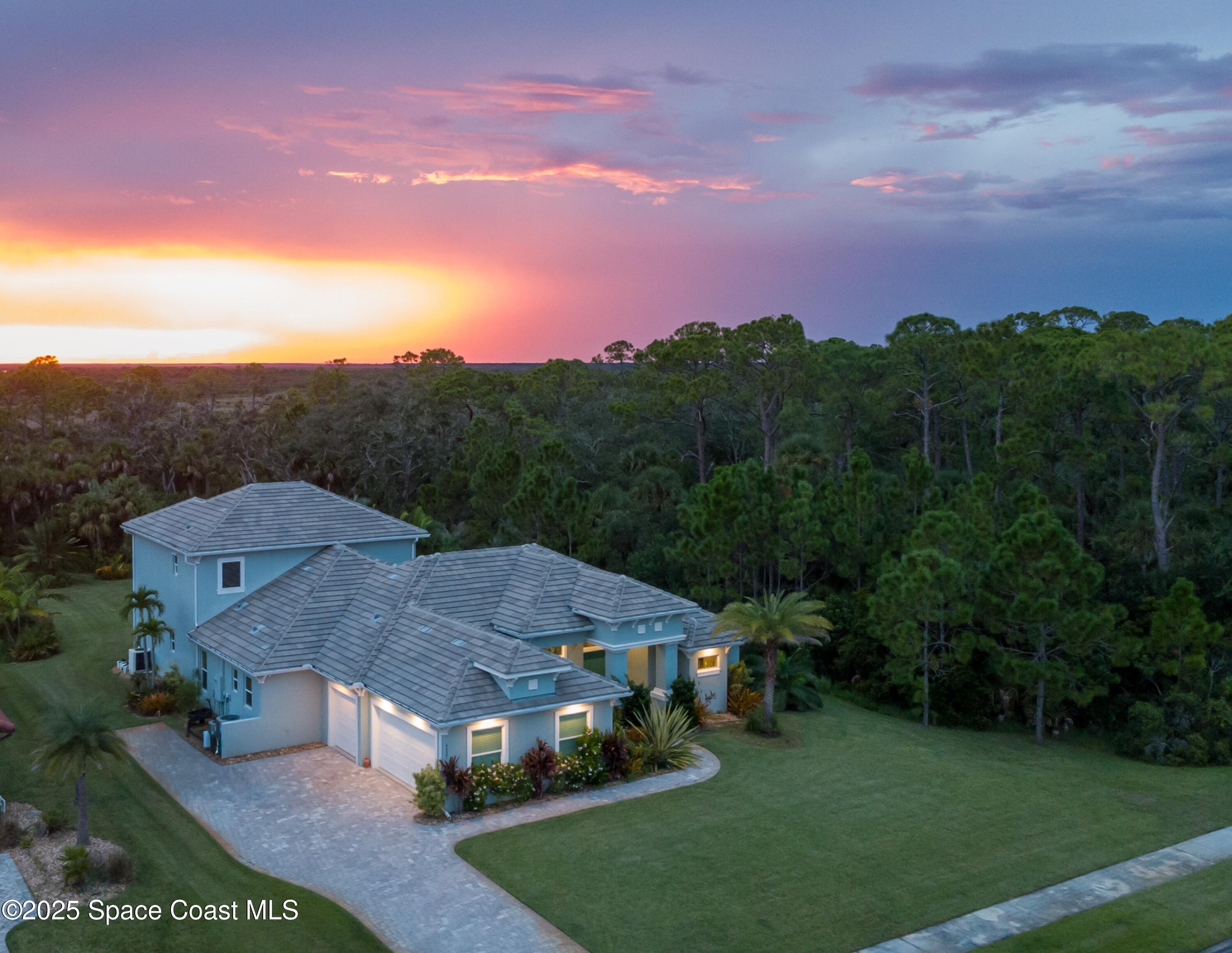 4437 Preservation Circle Melbourne, FL 32934 - Photo 30 of 40 a aerial view of a house with a yard