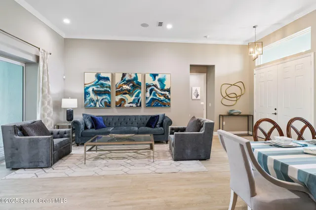 a living room with furniture and a couch