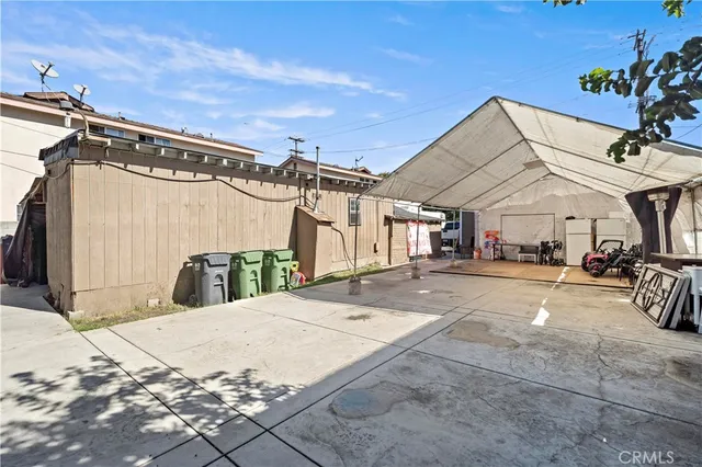a view of a house with a snow in the background