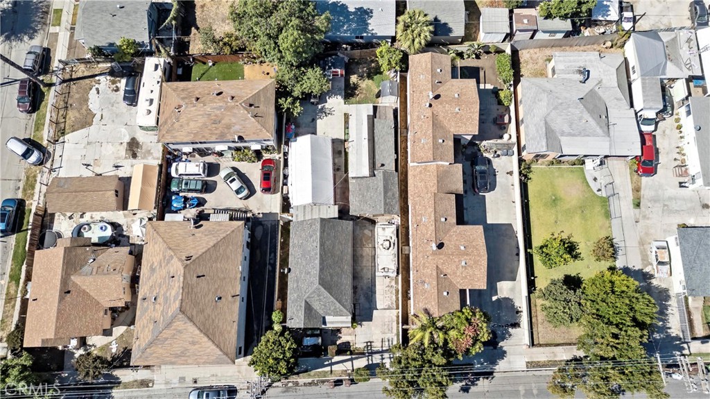 309 North Willowbrook Avenue Compton, CA 90220 - Photo 2 of 24 an aerial view of residential houses with outdoor space