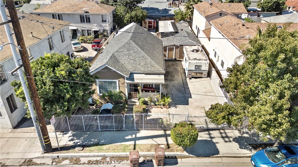309 North Willowbrook Avenue Compton, CA 90220 - Photo 5 of 24 a aerial view of a house with a yard