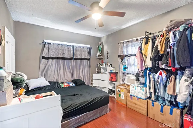 a bed room with a bed and a couch