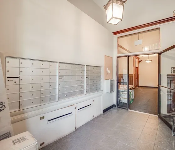 a view of workspace with chandelier