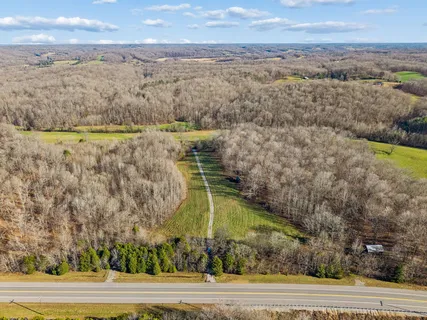 a view of a lake with a yard