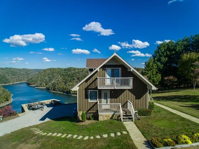 11775 Fox Hill Road Baxter, TN 38544 - Photo 1 of 19 a front view of a house with a yard