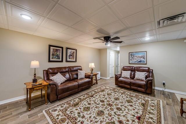 11775 Fox Hill Road Baxter, TN 38544 - Photo 13 of 19 a living room with furniture and a rug