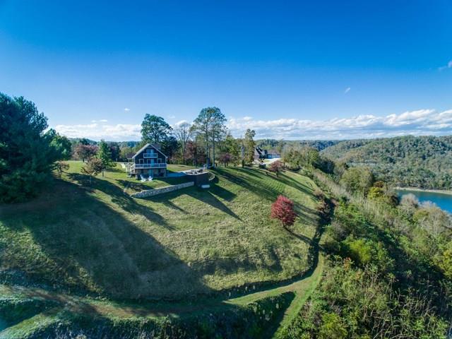 11775 Fox Hill Road Baxter, TN 38544 - Photo 19 of 19 a view of a garden with lawn chairs