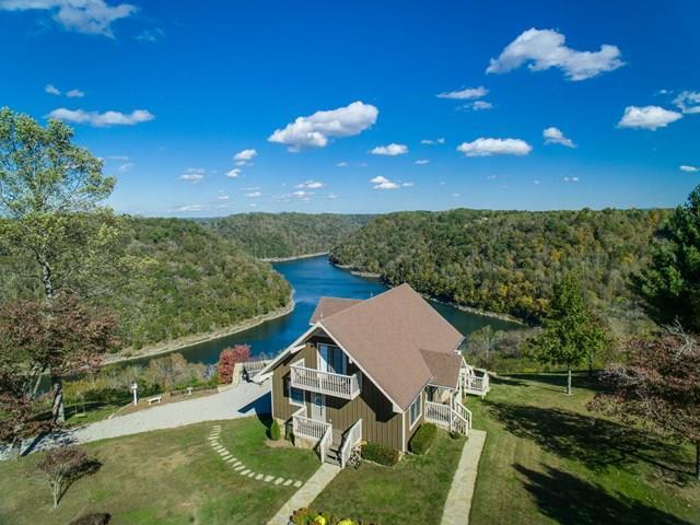 11775 Fox Hill Road Baxter, TN 38544 - Photo 2 of 19 a view of a swimming pool with a patio and a garden