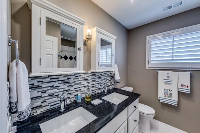 11775 Fox Hill Road Baxter, TN 38544 - Photo 10 of 19 a bathroom with a sink a toilet and window