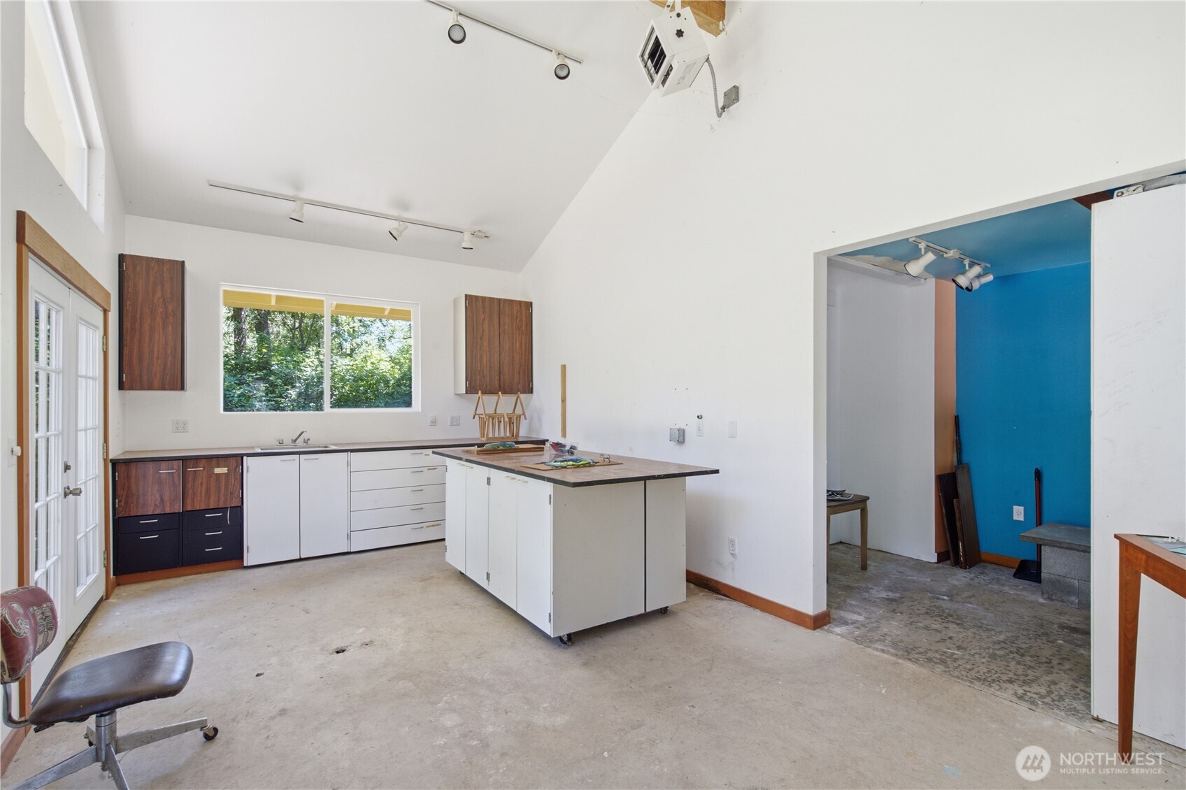 3050 Southeast Mullenix Road Port Orchard, WA 98367 - Photo 35 of 40 a kitchen with a stove and a refrigerator