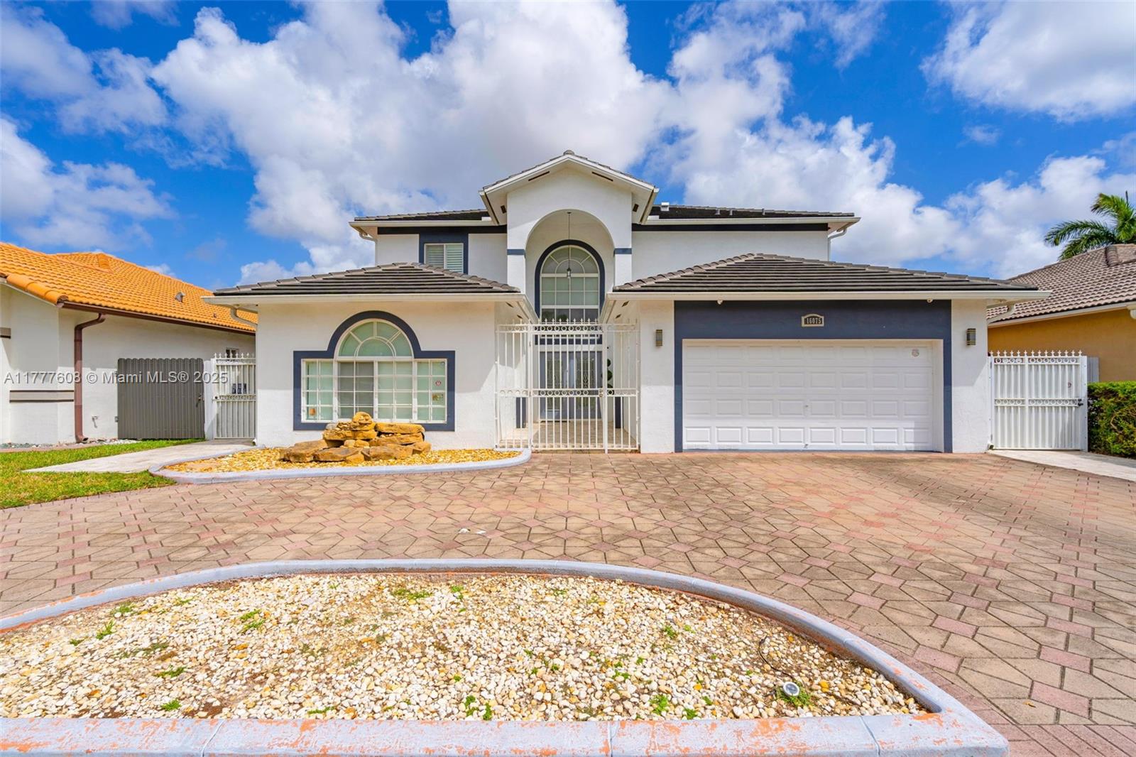 16075 Southwest 149th Terrace Miami, FL 33196 - Photo 1 of 46 a view of pool with a house in the background