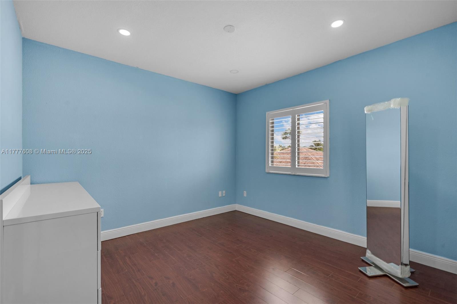 16075 Southwest 149th Terrace Miami, FL 33196 - Photo 29 of 46 a room with a workspace
