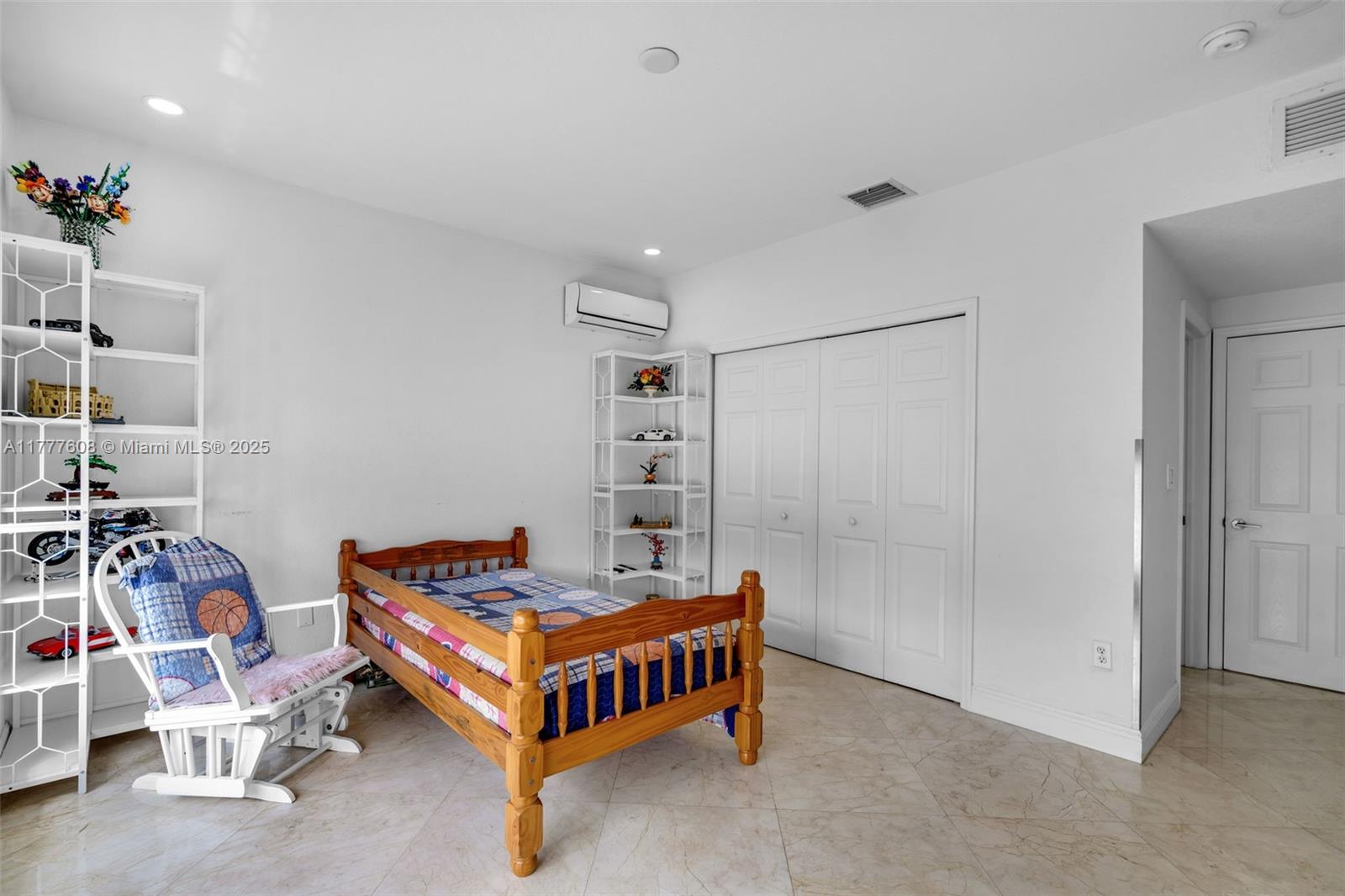 16075 Southwest 149th Terrace Miami, FL 33196 - Photo 32 of 46 a room with a table chairs and a projector screen