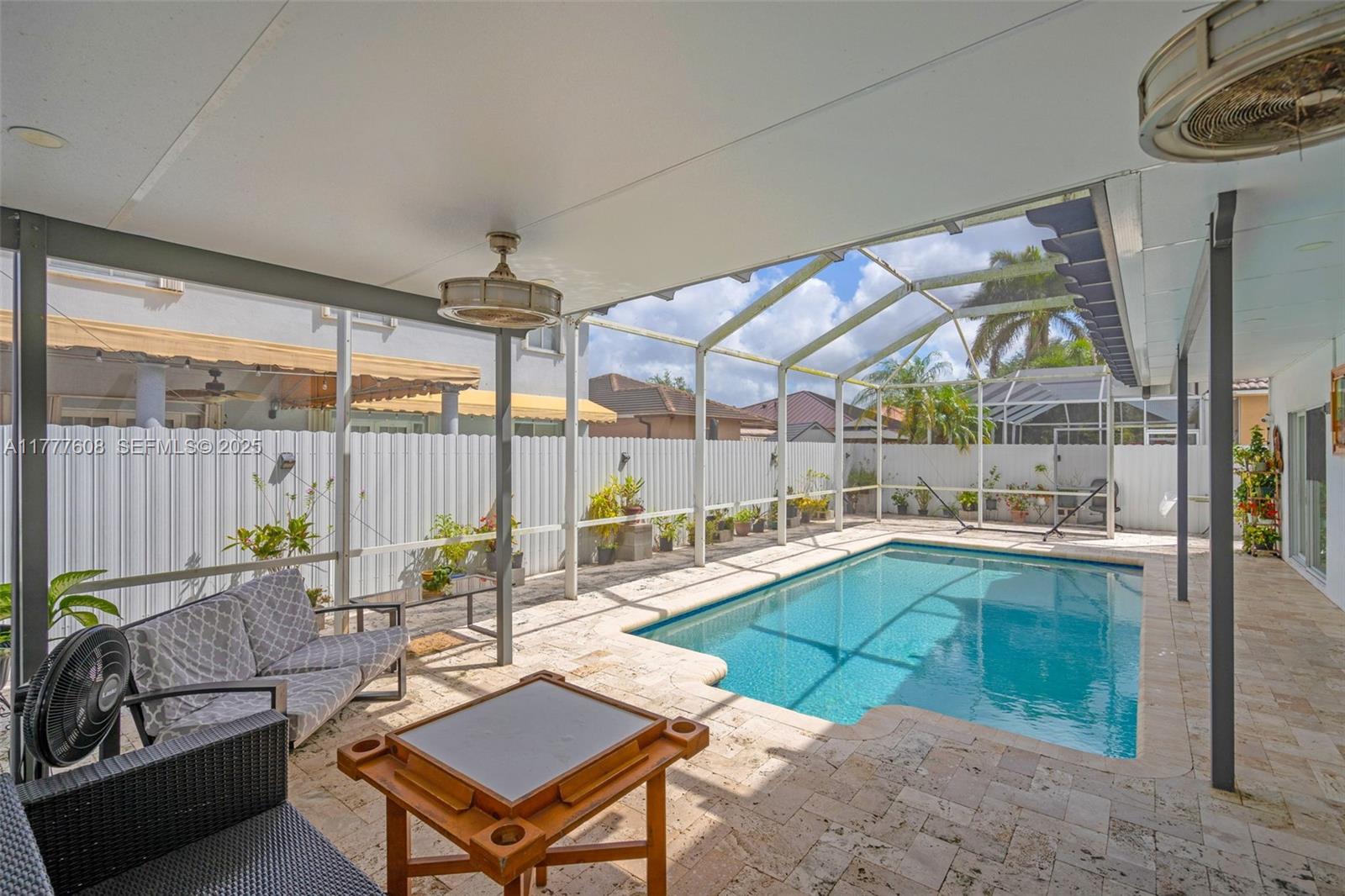 16075 Southwest 149th Terrace Miami, FL 33196 - Photo 38 of 46 a outdoor living space with furniture