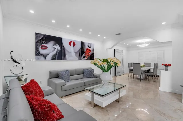 a living room with furniture and a couch