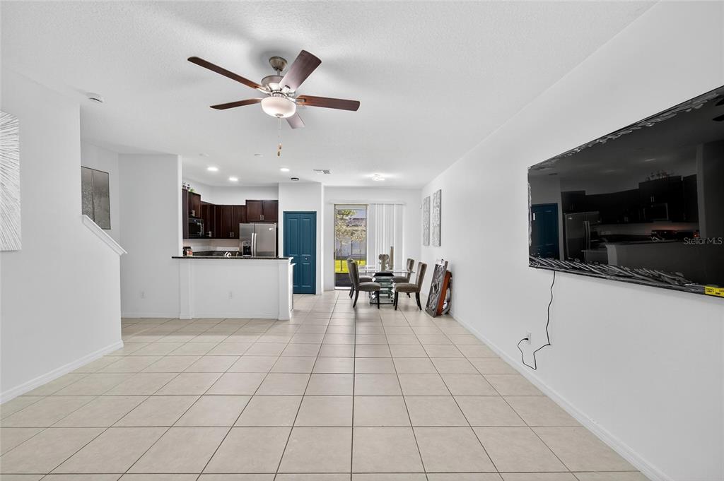 14446 Editors Note Street Ruskin, FL 33573 - Photo 12 of 52 a view of kitchen with microwave and cabinets