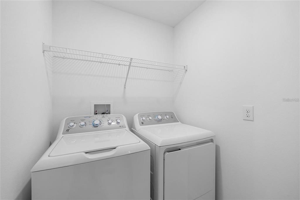 14446 Editors Note Street Ruskin, FL 33573 - Photo 42 of 52 a utility room with dryer and washer