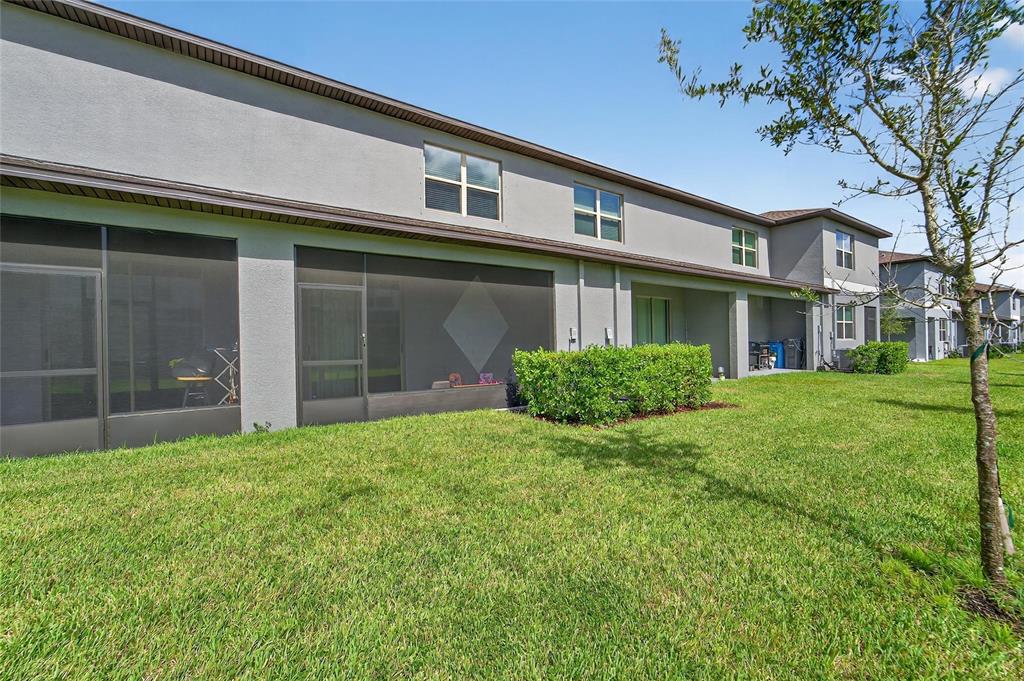 14446 Editors Note Street Ruskin, FL 33573 - Photo 48 of 52 a view of house with yard