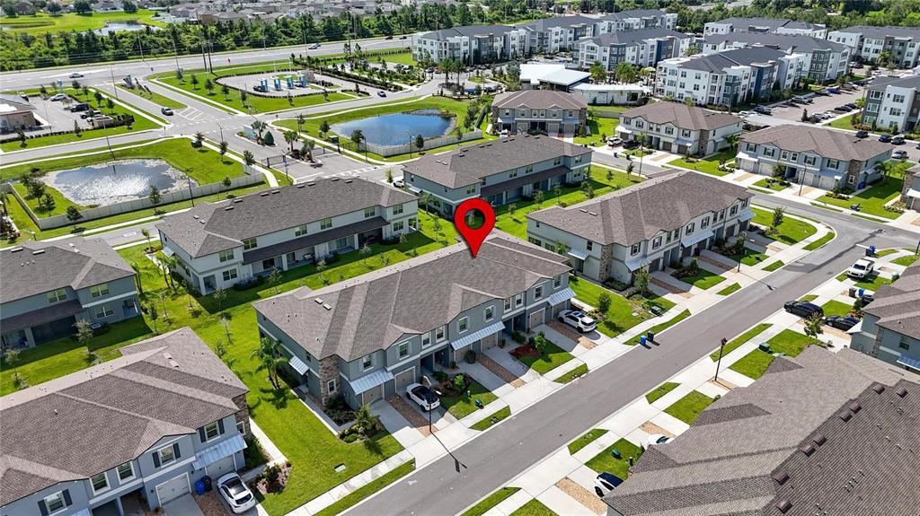 14446 Editors Note Street Ruskin, FL 33573 - Photo 6 of 52 an aerial view of a house with a swimming pool yard and outdoor seating