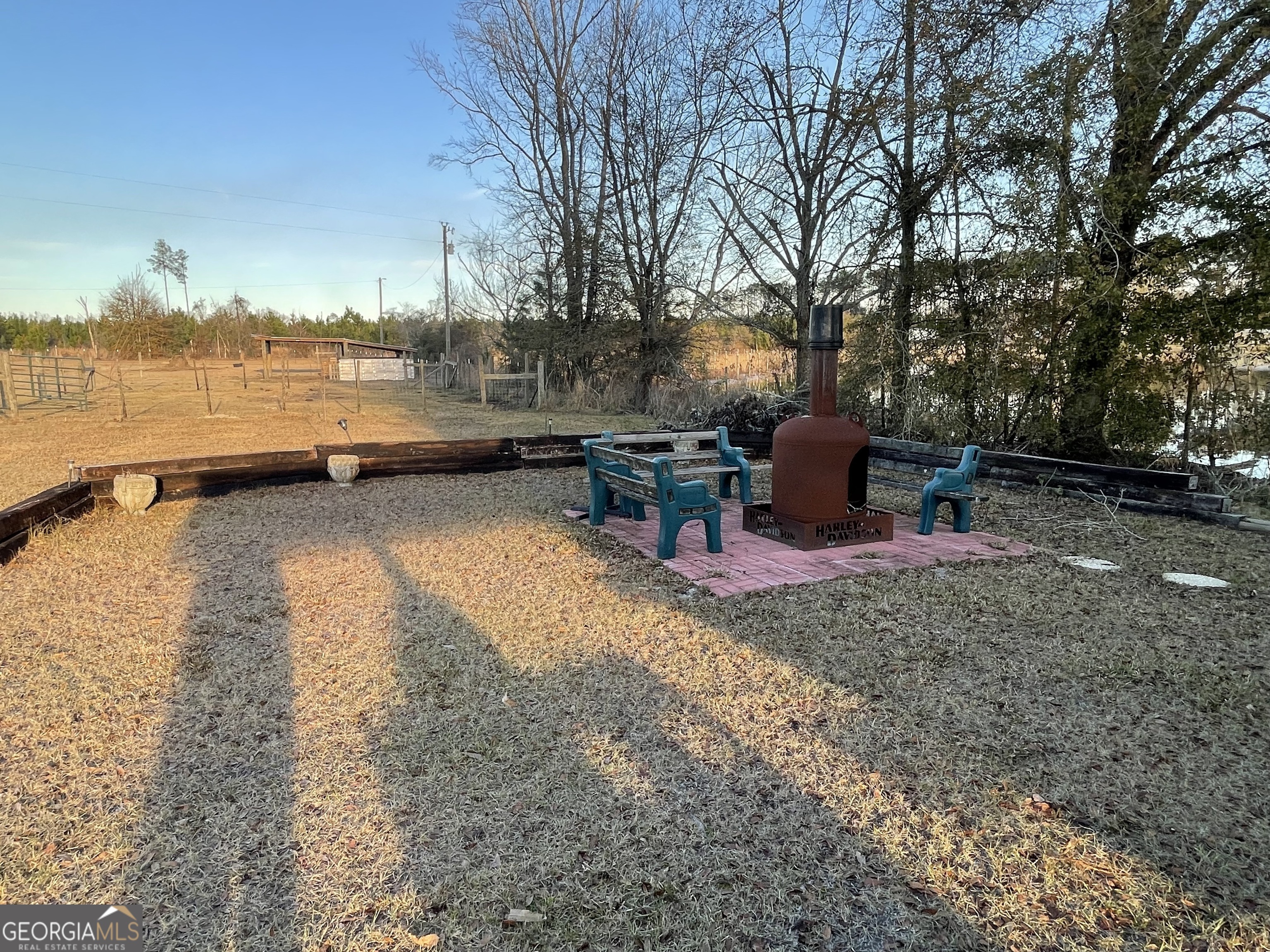 275 Marchants Dairy Road Rhine, GA 31077 - Photo 26 of 42 a view of a backyard with sitting area