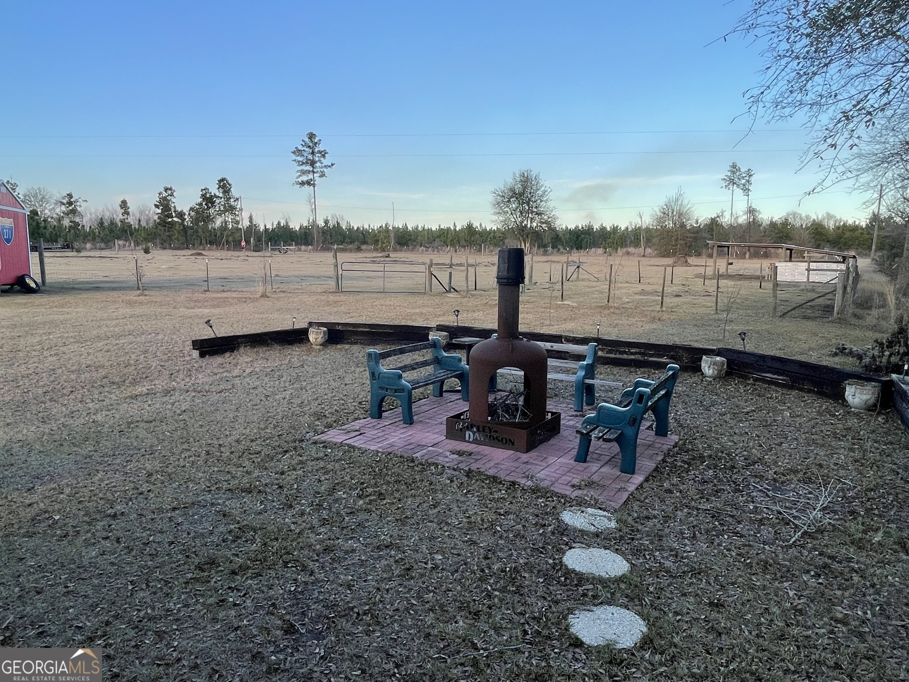 275 Marchants Dairy Road Rhine, GA 31077 - Photo 27 of 42 a view of a backyard with sitting area