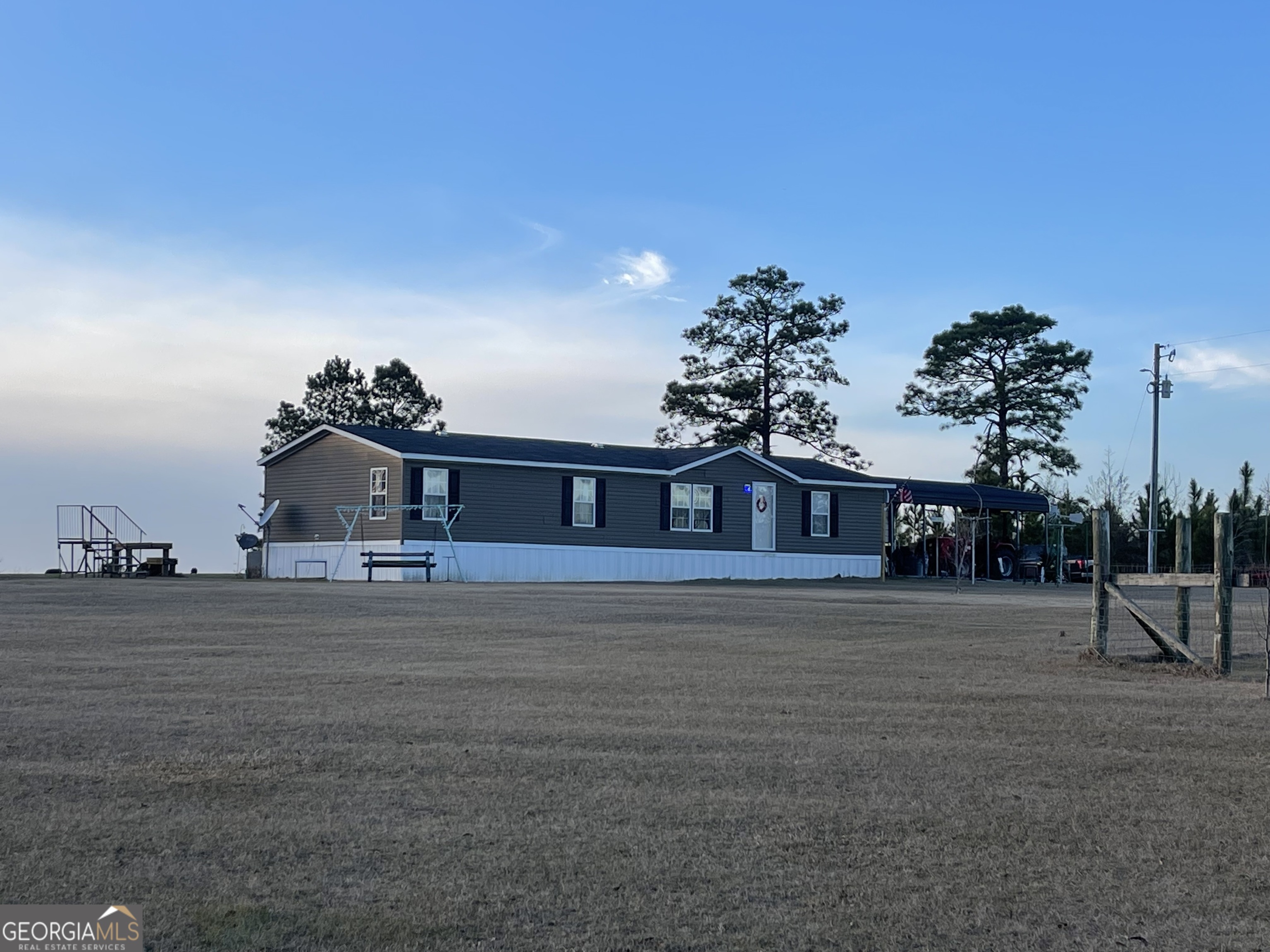 275 Marchants Dairy Road Rhine, GA 31077 - Photo 3 of 42 a front view of a house with a yard