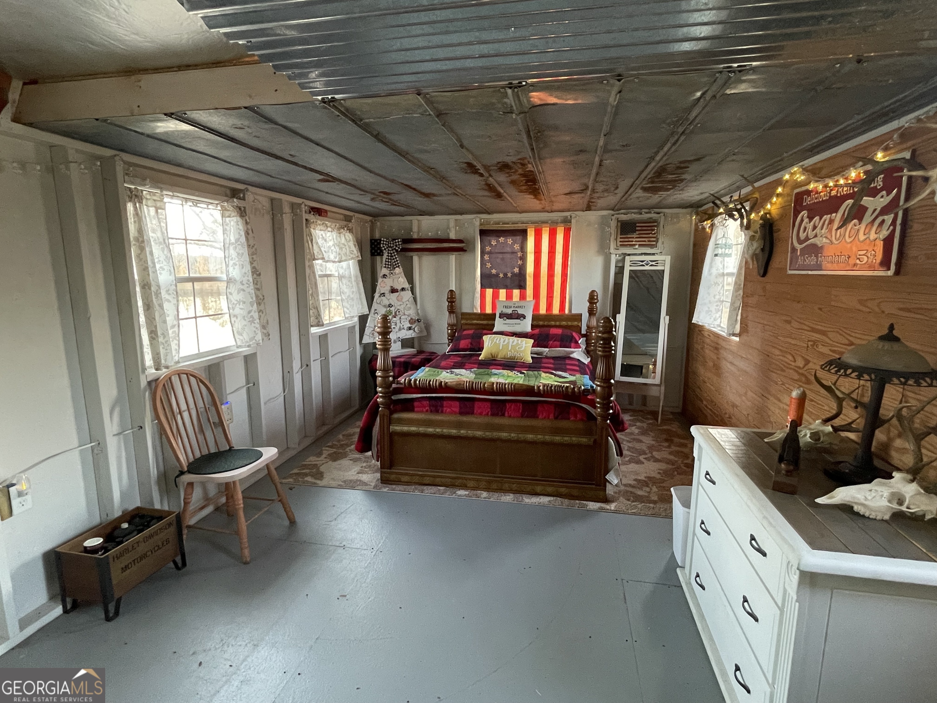 275 Marchants Dairy Road Rhine, GA 31077 - Photo 31 of 42 a bedroom with furniture and a window
