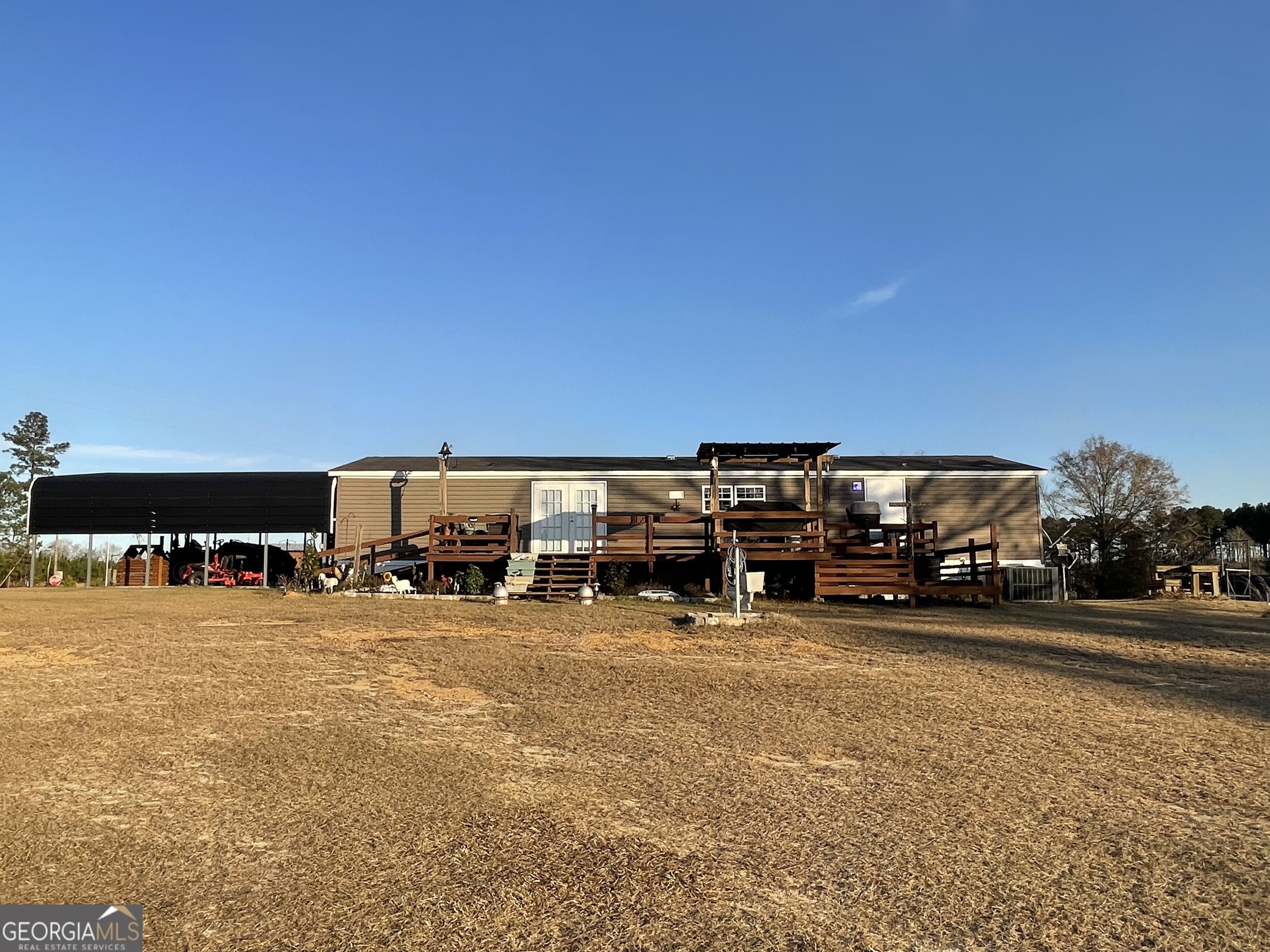 275 Marchants Dairy Road Rhine, GA 31077 - Photo 7 of 42 a view of a parking area