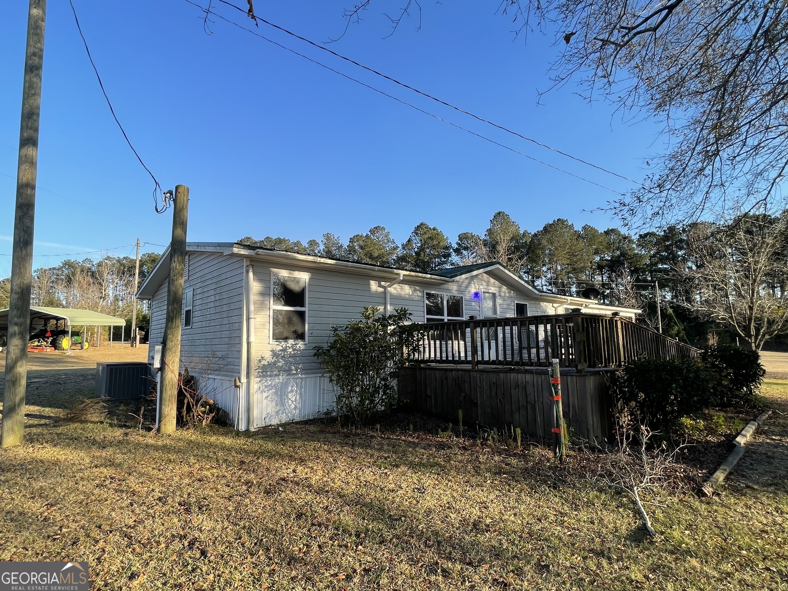 275 Marchants Dairy Road Rhine, GA 31077 - Photo 10 of 42 a view of a house with a yard