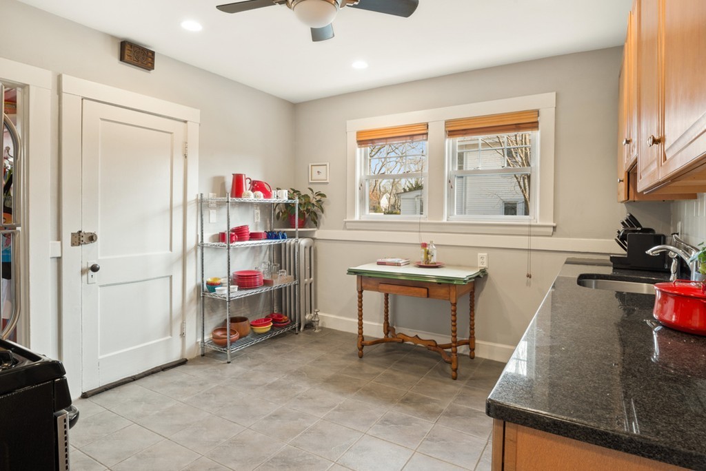 89-91 Elm Road, Unit 1 Newton, MA 02460 - Photo 8 of 18 a room with furniture and a window