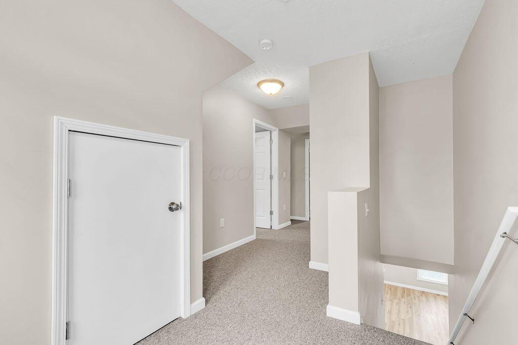 3841 South Section Line Road Delaware, OH 43015 - Photo 24 of 65 Upstairs Hallway