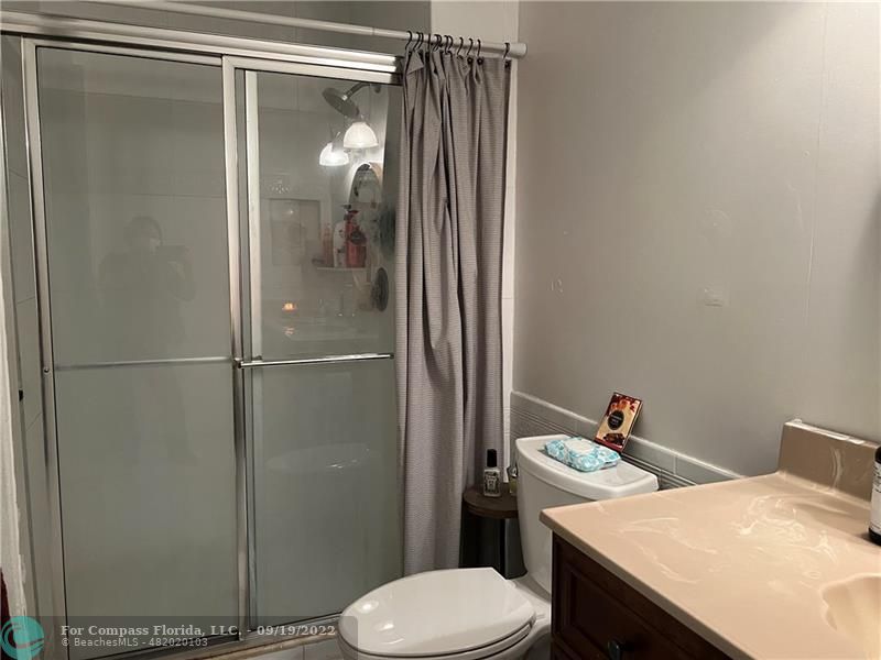 22465 Southwest 61st Way, Unit 241 Boca Raton, FL 33428 - Photo 12 of 18 a bathroom with a sink and toilet