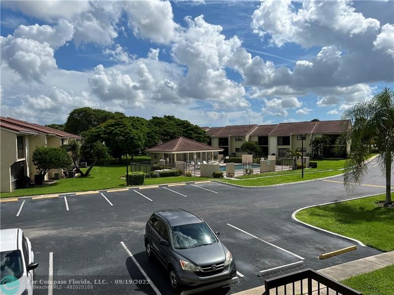 22465 Southwest 61st Way, Unit 241 Boca Raton, FL 33428 - Photo 18 of 18 a view of a backyard with sitting area