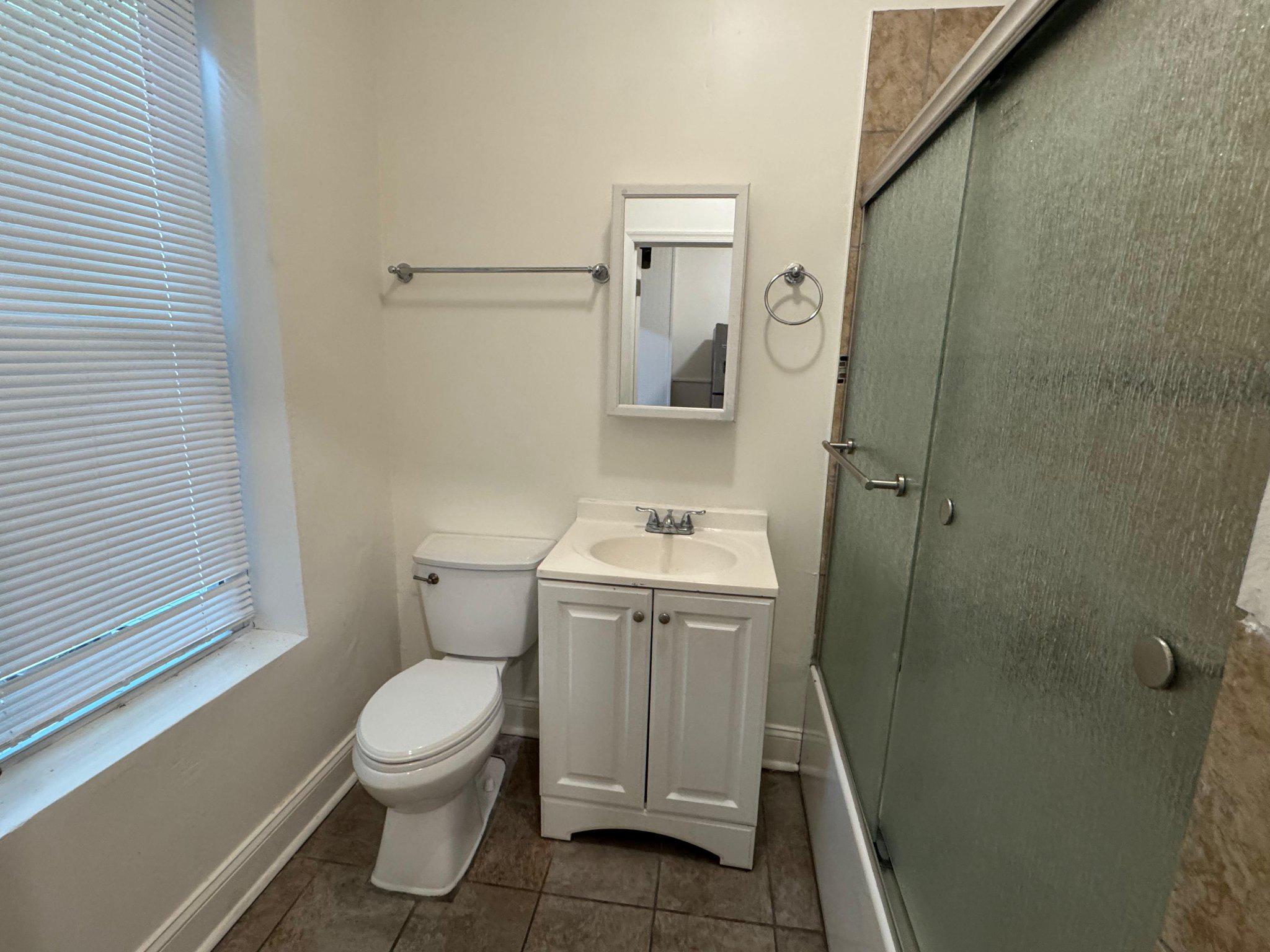 707 Denison Street Baltimore, MD 21229 - Photo 16 of 18 2F Bth2. Modern bathroom with sleek finishes.