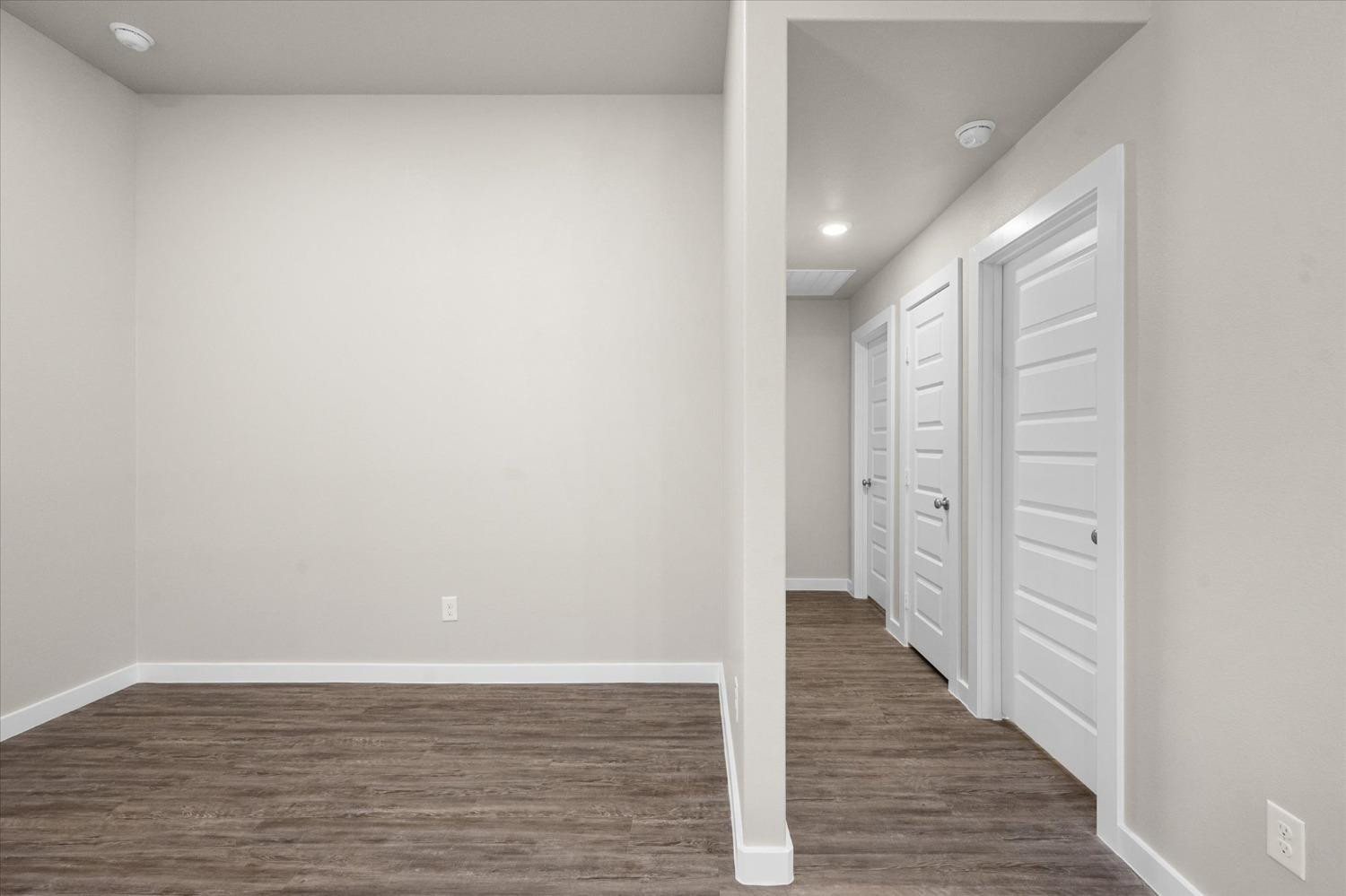 1608 142nd Street Lubbock, TX 79423 - Photo 12 of 20 a view of a hallway with wooden floor