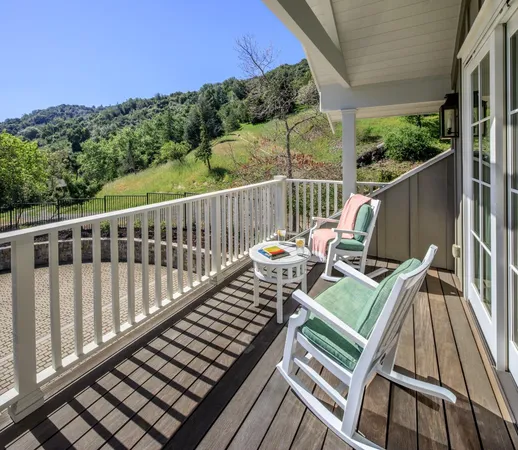 a front view of a house with a yard outdoor seating and entertaining space