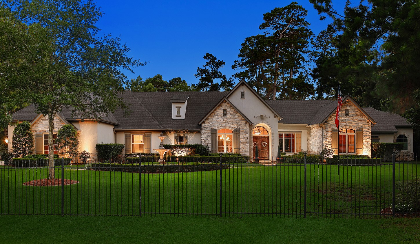 119 Angel Leaf Road The Woodlands, TX 77380 - Photo 4 of 50 a front view of a house with a garden and plants