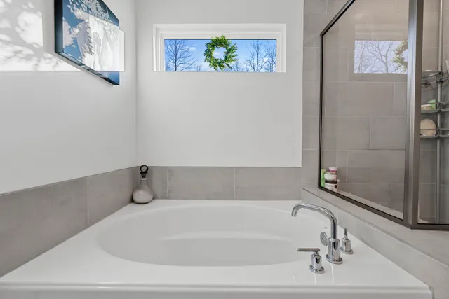 a bedroom with furniture and a bed