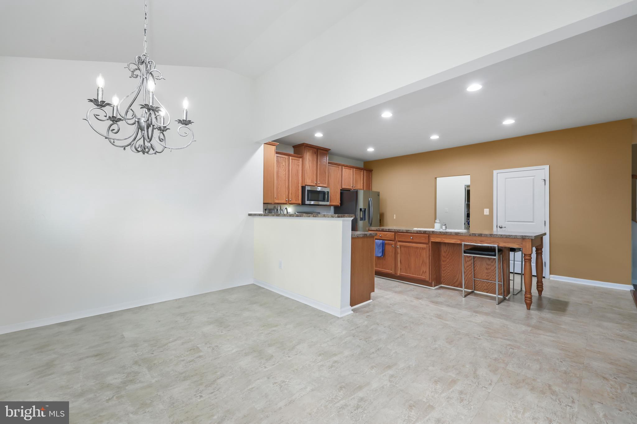112 Northumberland Drive Stephenson, VA 22656 - Photo 15 of 58 a kitchen with stainless steel appliances granite countertop a refrigerator and a stove top oven