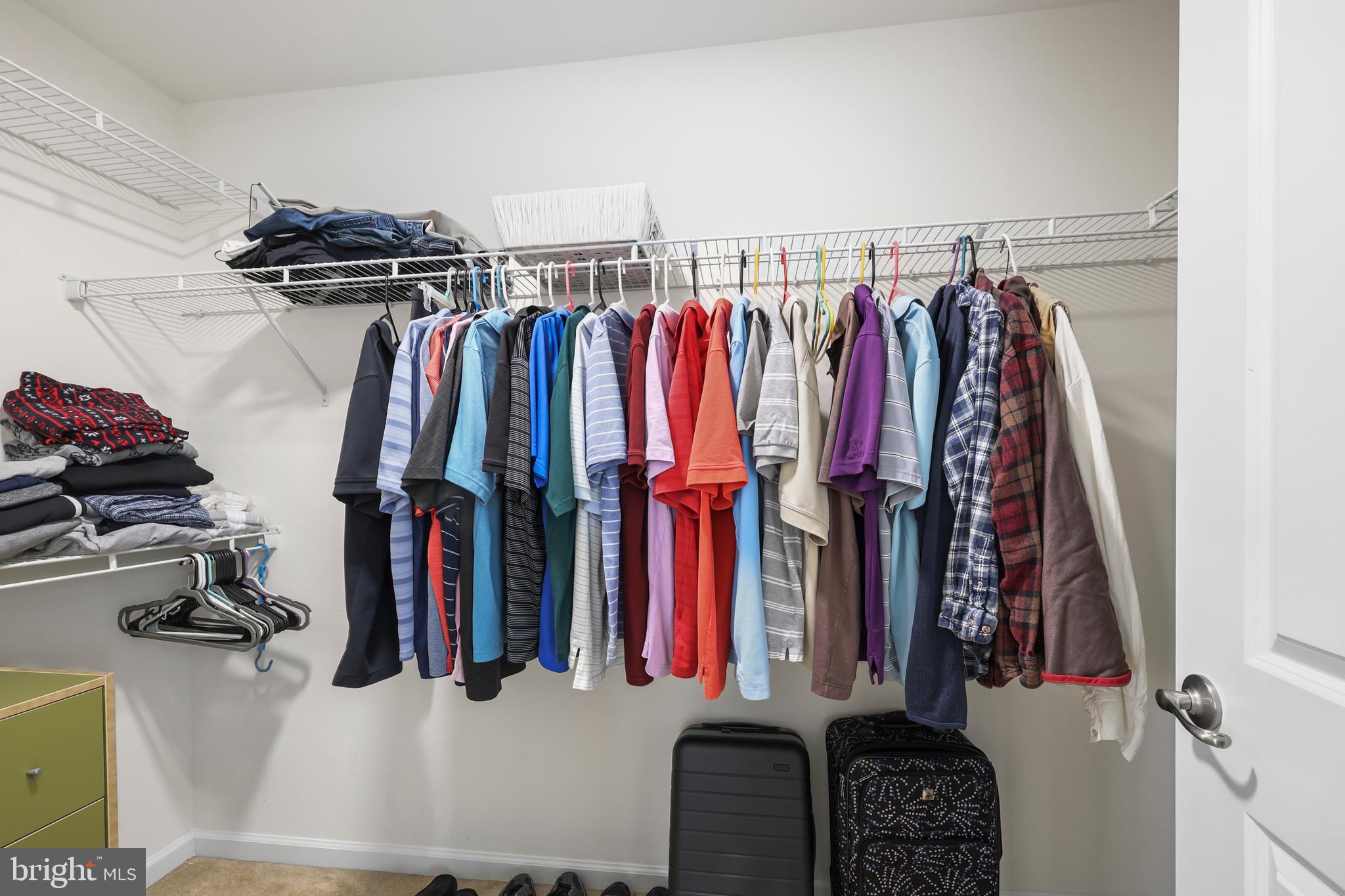 112 Northumberland Drive Stephenson, VA 22656 - Photo 24 of 58 a view of walk in closet with clothes and shoes
