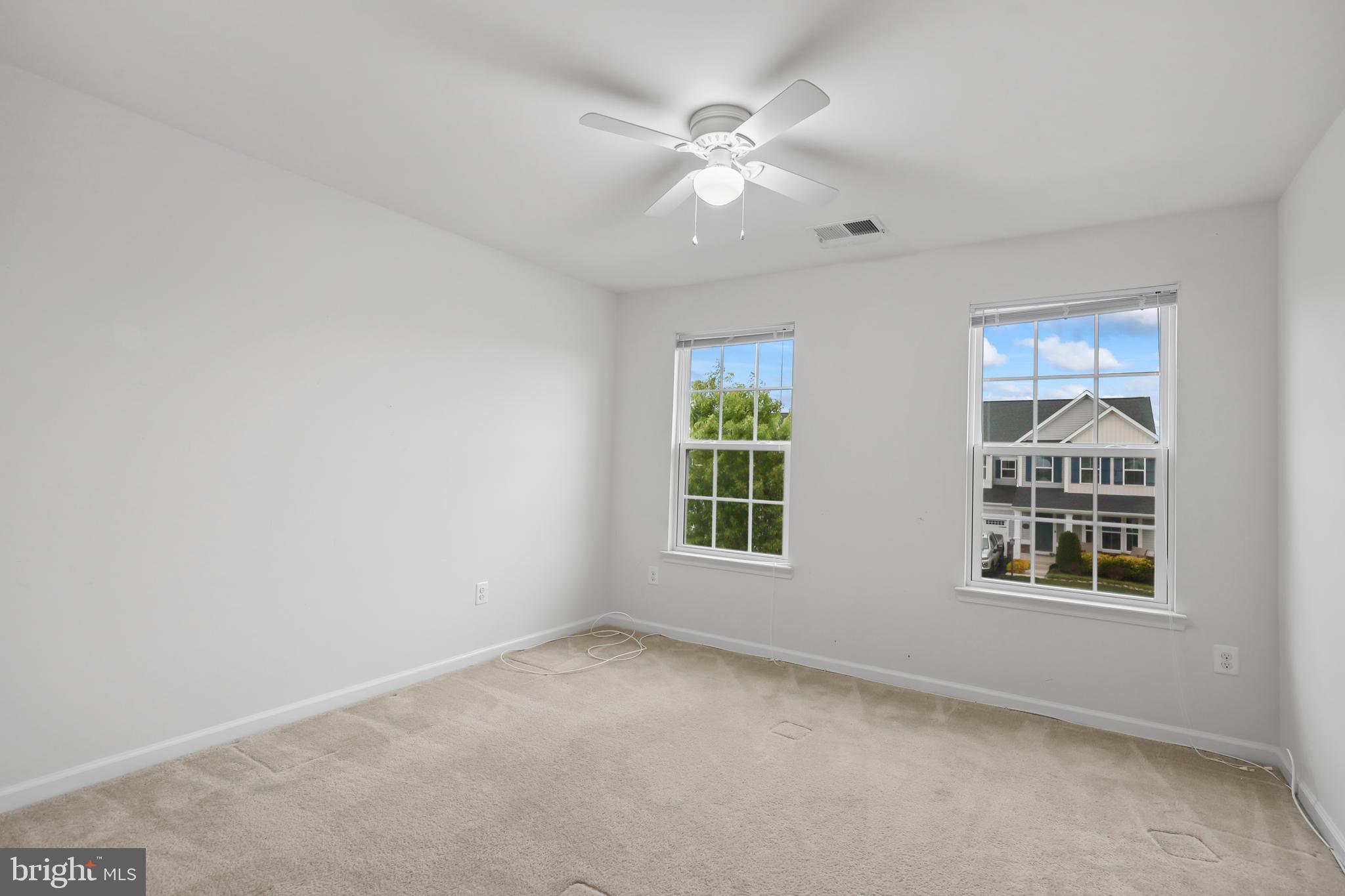 112 Northumberland Drive Stephenson, VA 22656 - Photo 25 of 58 an empty room with windows and fan