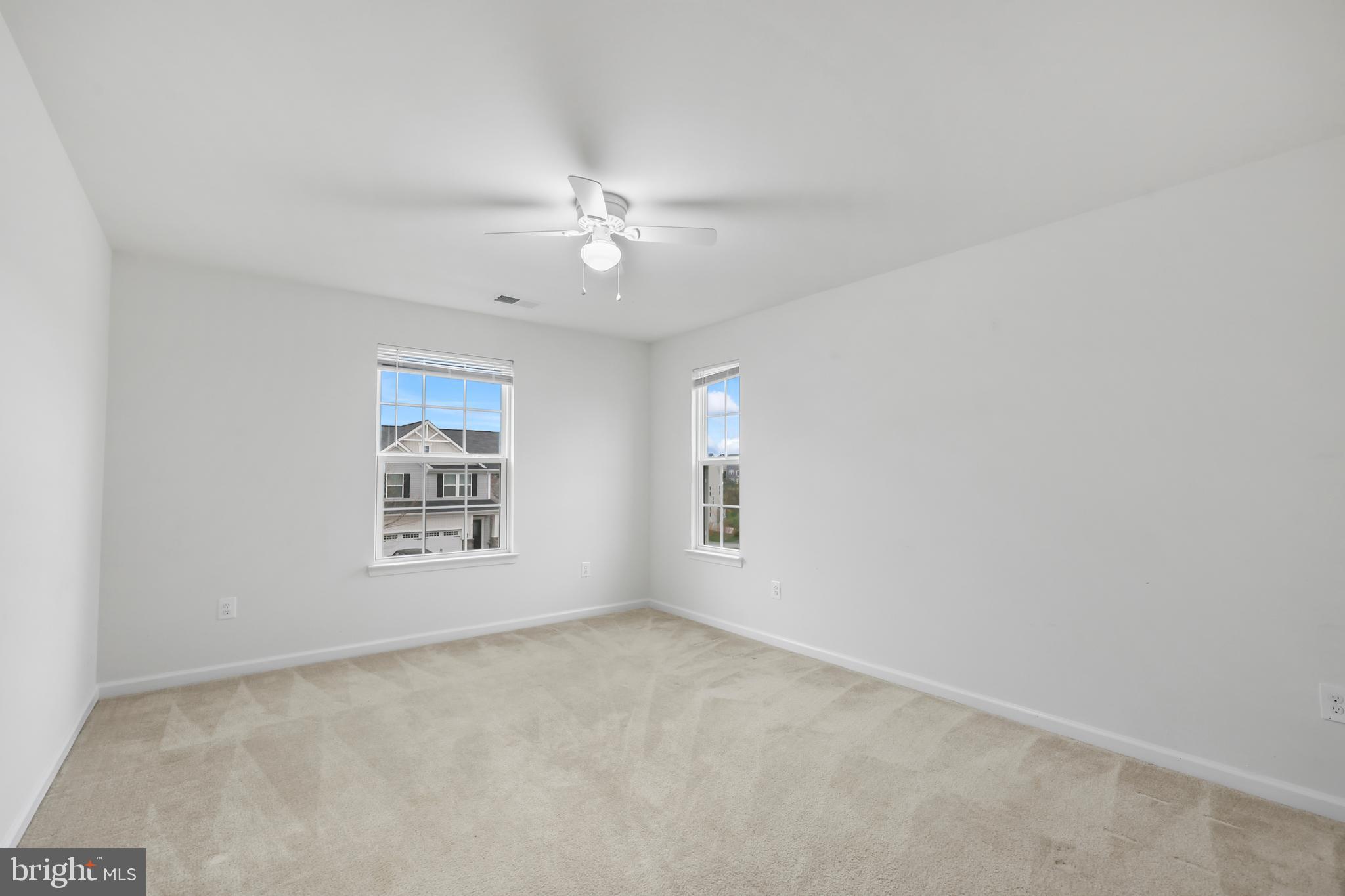 112 Northumberland Drive Stephenson, VA 22656 - Photo 31 of 58 an empty room with a empty space and windows