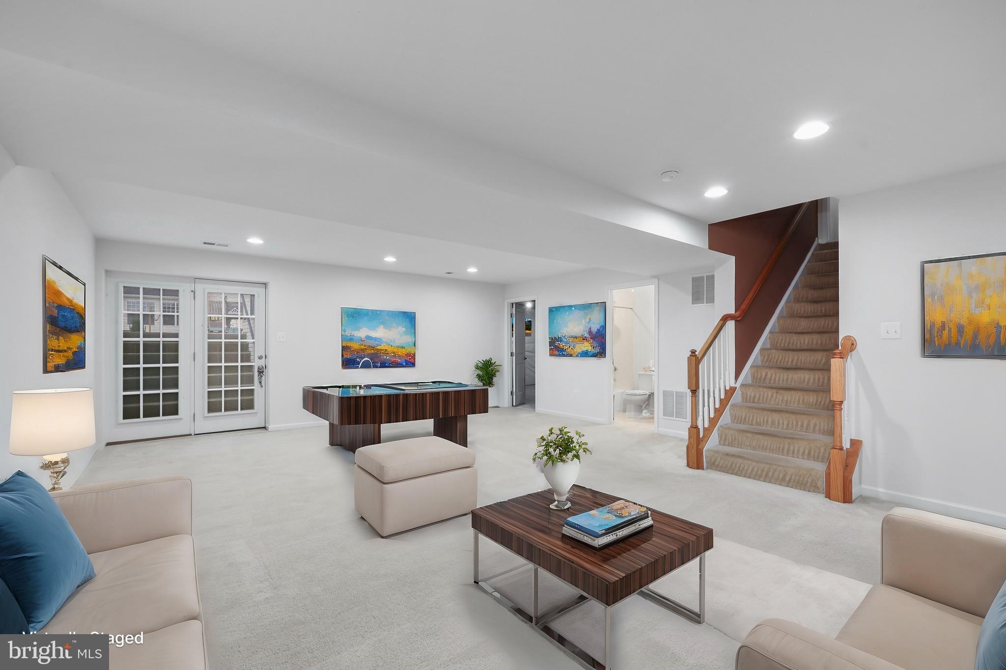 112 Northumberland Drive Stephenson, VA 22656 - Photo 35 of 58 a living room with furniture and a wooden floor