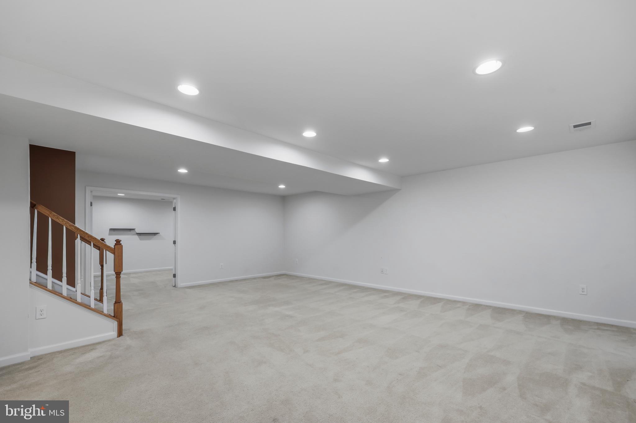 112 Northumberland Drive Stephenson, VA 22656 - Photo 38 of 58 an empty room with stairs and ventilation