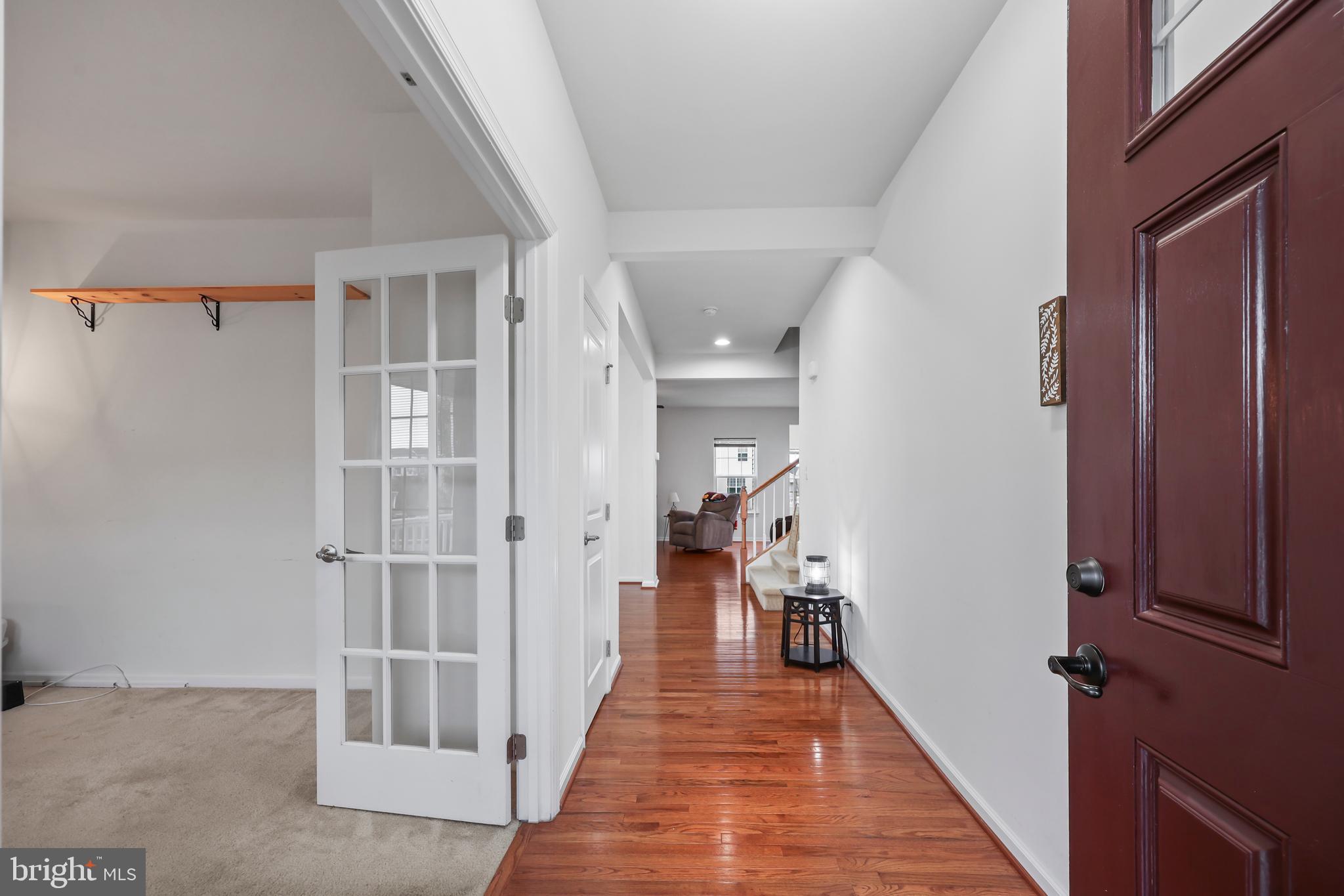 112 Northumberland Drive Stephenson, VA 22656 - Photo 4 of 58 a hallway with wooden floor and closet