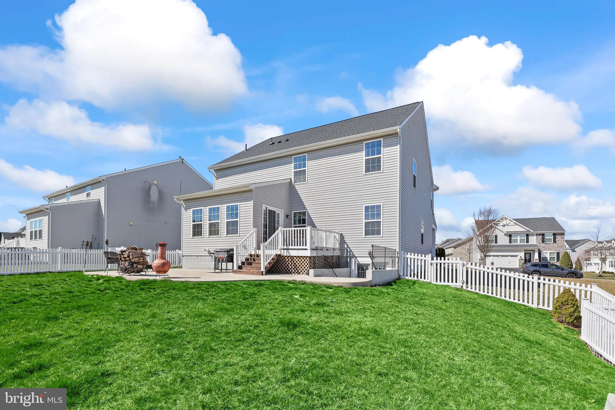 112 Northumberland Drive Stephenson, VA 22656 - Photo 48 of 58 a front view of a house with garden and sitting area
