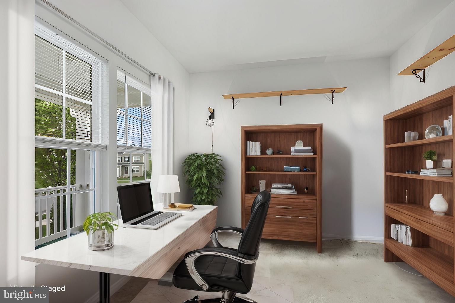 112 Northumberland Drive Stephenson, VA 22656 - Photo 5 of 58 a view of a workspace with furniture and a window