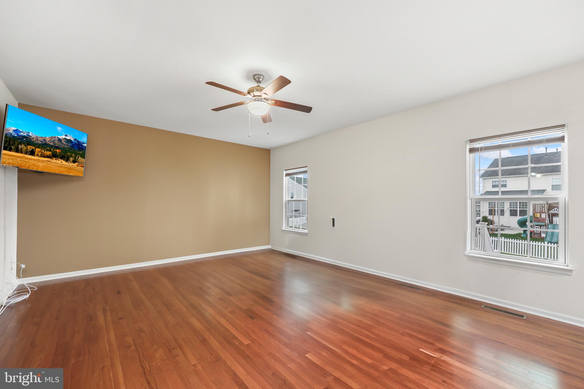 112 Northumberland Drive Stephenson, VA 22656 - Photo 9 of 58 a view of an empty room with window and wooden floor