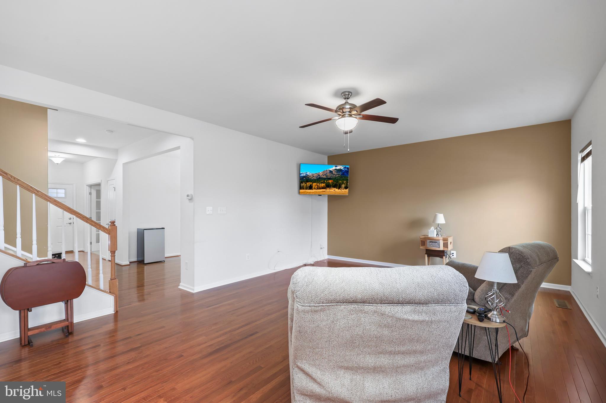 112 Northumberland Drive Stephenson, VA 22656 - Photo 10 of 58 a bedroom with a bed and a chandelier